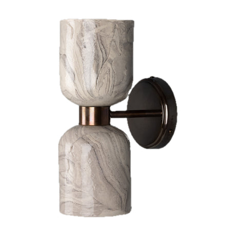 Sakura Ceramic Twin Wall Light in marbled glaze, two cylindrical ceramic shades facing up and down, joined by a brass collar and arm on a round wall plate, shown on a white background.
