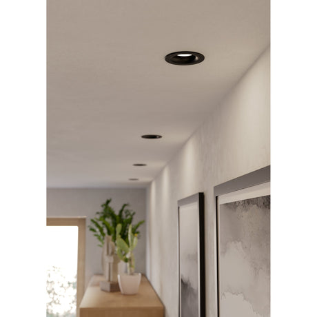 Salabate LED Downlight Set of 3 in black with aluminium body, recessed into a hallway ceiling leading past framed artwork and a wooden console.