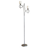 The San Marino 2 Light Opal Glass Floor Lamp features a modern pewter base and stem, with two upward-facing opal glass shades held by curved decorative arms for a stylish lighting accent.