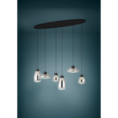 Sarnarra linear pendant light with six smoked glass shades of mixed bottle and dome shapes hung at varying heights from a black oval ceiling plate, shown against a dark teal background.