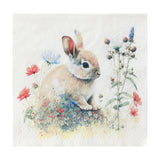 Sasaram paper napkin with watercolour print of a young rabbit among red, pink and pale blue wildflowers on a white background, three-ply, square 16.5cm design.