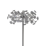 The Savanna 3 Light Crystal Floor Lamp in polished chrome features multiple crystal discs clustered in a modern spherical design, creating a striking burst effect.