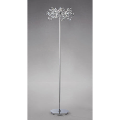 The Savanna 3 Light Crystal Floor Lamp in polished chrome features a tall, modern design with a shiny base and pole, topped by a decorative cluster of clear crystals that resemble delicate flowers or branches.