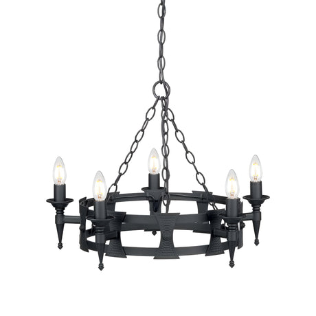 The Saxon 5 Light Chandelier in black is a wrought iron fixture that boasts a circular structure and medieval-inspired design. It features five candle-shaped lights, each topped with a bulb, and is elegantly suspended by chains.