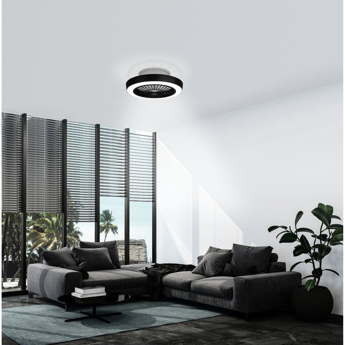 Sazan round ceiling fan with light in black and white, featuring a black outer band, milky acrylic diffuser ring, and black radial grille, shown mounted flush in a modern grey living room.