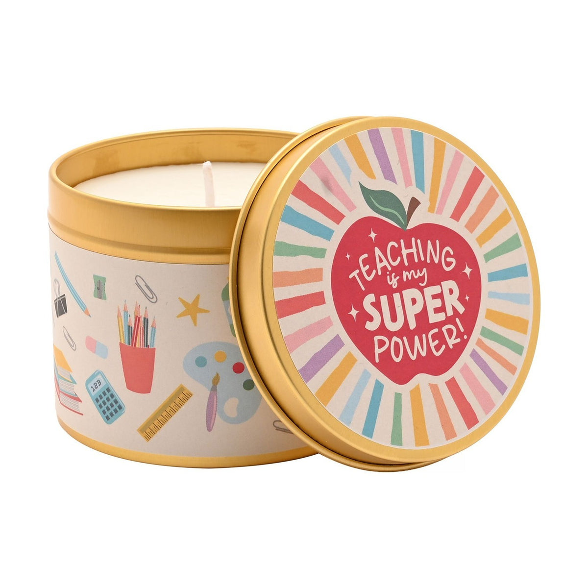 Round gold tin scented candle with lid, cream label printed with classroom items, lid featuring a red apple and "Teaching is my super power" text on pastel stripes.