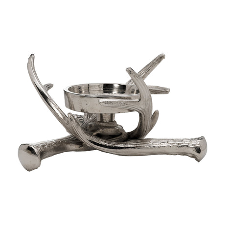 Selising Candle Holder 10cm in nickel-finish aluminium, styled as crossed antlers forming a low base with a central round cup, shown on a plain white background.