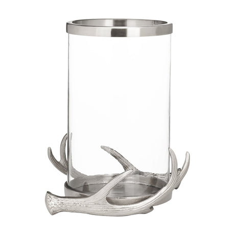 Selising Candle Holder 26cm in Nickel, a clear glass hurricane set in a cast aluminium antler base with polished nickel finish, shown on a plain white background.