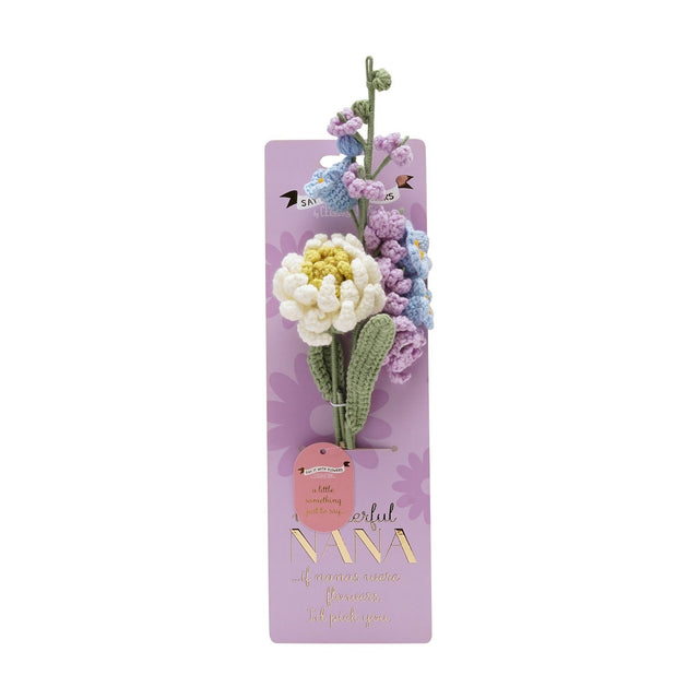Wonderful Nana Peony and Foxglove Crochet Flower Bundle featuring a cream peony, lilac foxglove, and pale blue blooms with green stems, tied to a lilac gift card with pink tag.