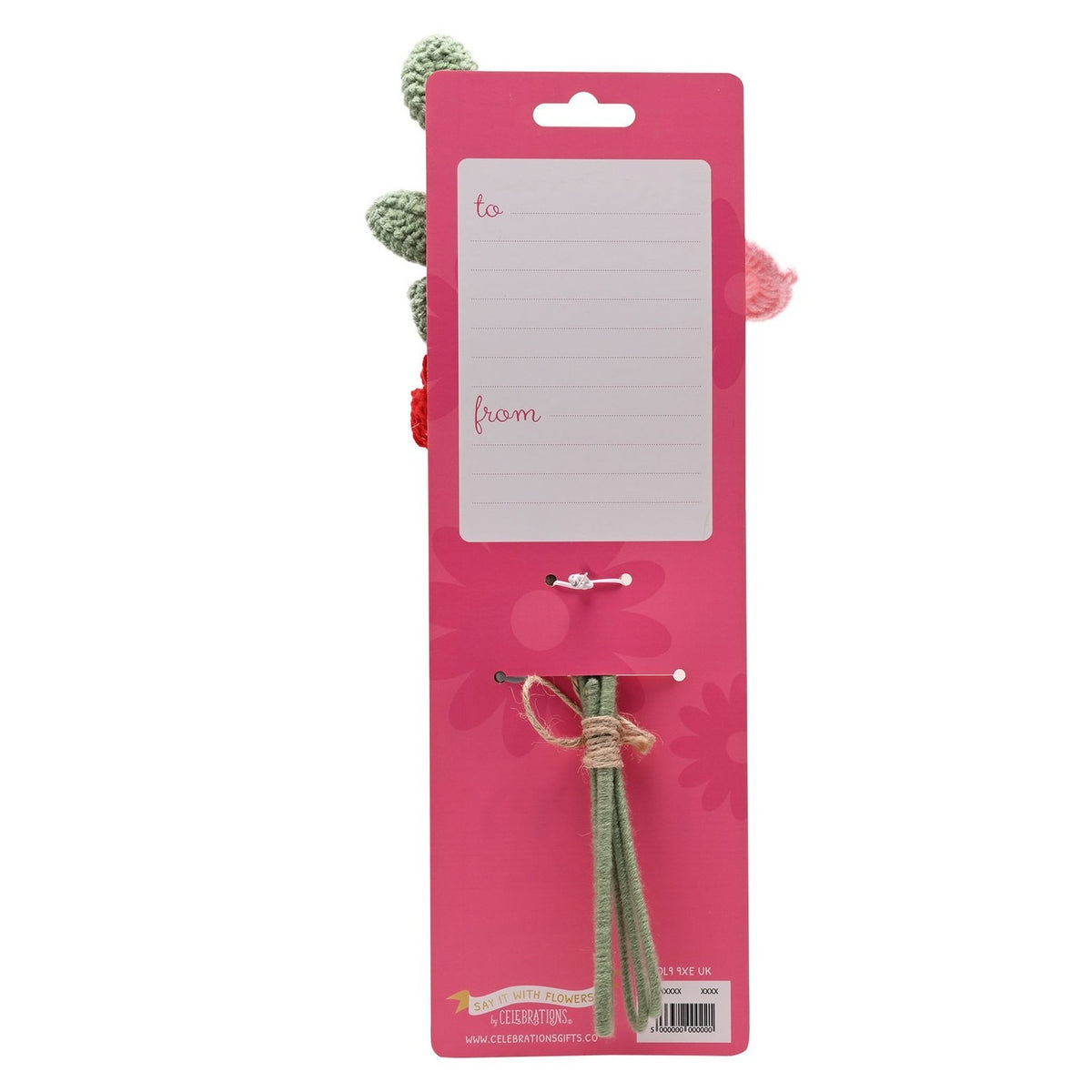 Crochet rose flower bundle on a pink gift card with "to/from" message lines, sage green yarn stems tied with twine, pink and red crocheted blooms and leaves visible at top.