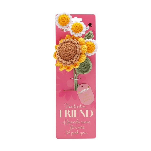 Crochet flower bundle with a yellow sunflower and three white daisies on green stems, mounted on pink "Fantastic Friend" packaging card.