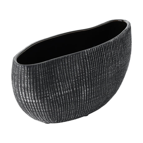 Shiguhe ceramic decorative bowl with an organic oval shape, wavy rim, black and brushed silver ribbed exterior, and glossy black interior, shown on a plain white background.