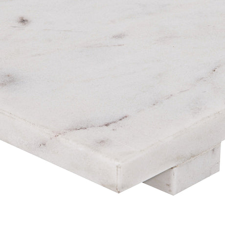 Close-up of the Siayan rectangular marble tray in white with soft grey veining, showing its flat top, squared edge, and raised block foot detail.