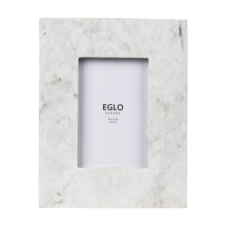 Siayan Photo Frame, a rectangular white marble frame with soft grey veining and a broad border, holding a 10x15cm portrait opening, shown on a plain background.