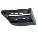 Introducing the Sigmund 6 Light Outdoor Wall Light - Graphite, a contemporary fixture featuring advanced LED technology with six circular bulbs arranged in two rows. Its sleek, rectangular design and curved cover deliver stylish illumination, making it an ideal choice for modern exteriors. Additionally, its IP65 rating guarantees durability against harsh weather conditions.