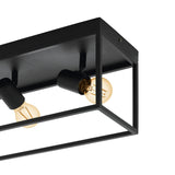Silentina 3 Light Ceiling Light in black steel, open rectangular frame with adjustable E27 spotlight heads and amber bulbs, shown close-up on a white background.