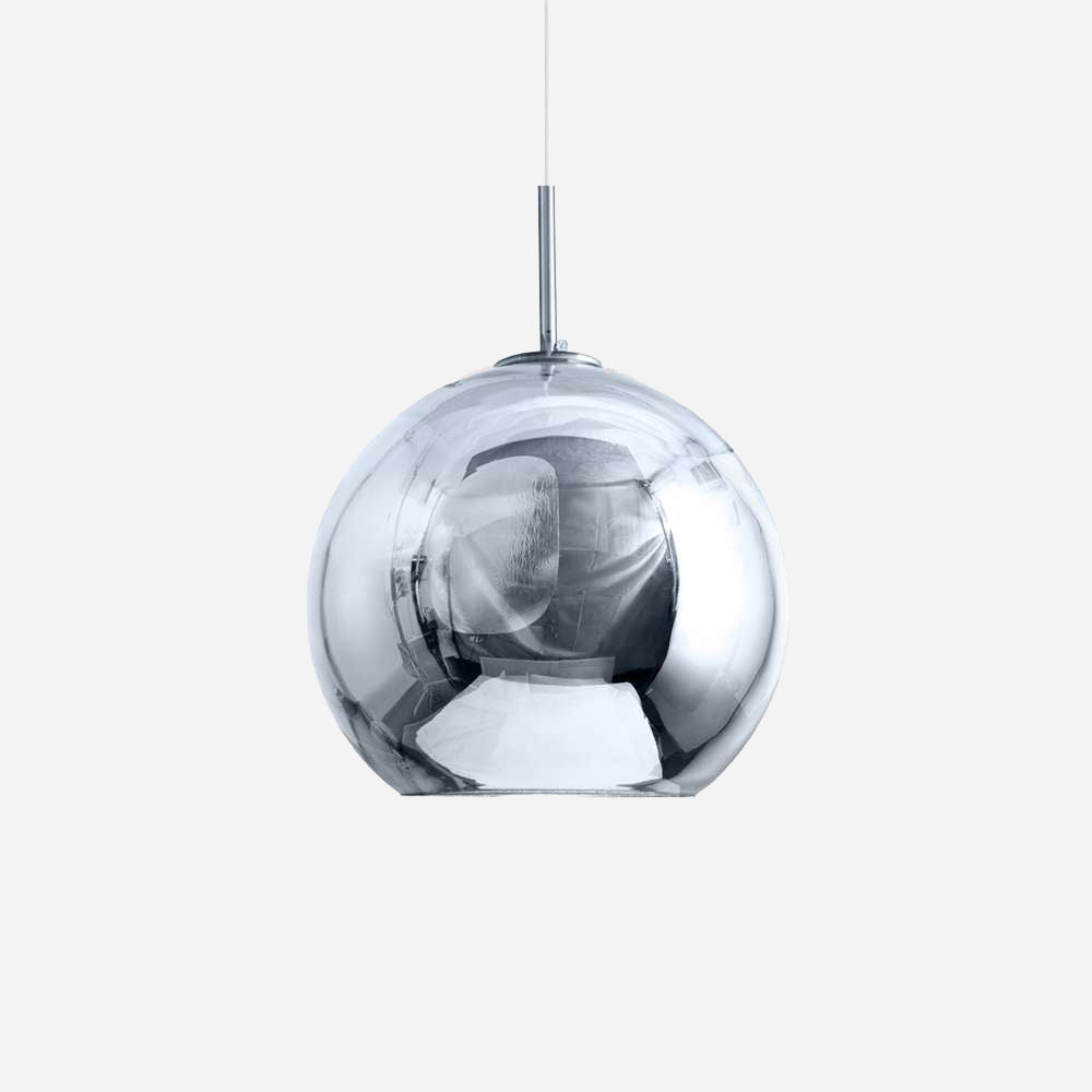 This Grand Ball Glass Pendant 25cm in Silver is a contemporary lighting element, showcased against a simple white backdrop. Its spherical design and lustrous surface produce a mirrored effect, gently reflecting the environment. The pendant light is compatible with LED bulbs, prioritizing energy efficiency while maintaining its stylish appeal.