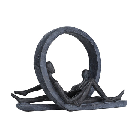 Siocon Figurines in black resin, showing two reclining figures inside a textured ring on a long flat base, set against a plain white background.