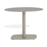 Sirkel round garden side table in beige aluminium, Ø90cm top on a single central leg with rounded square base, 55cm high, shown on a plain white background.