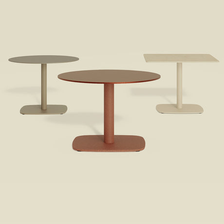 Sirkel Ø80cm round aluminium bistro table in terracotta with central pedestal leg and square base, shown with grey and ivory versions on a plain background.
