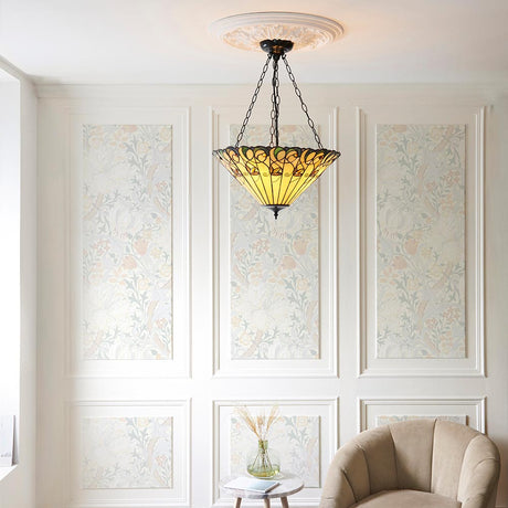 Tiffany Larncombe 3 light inverted pendant with 500mm multicoloured leaded glass bowl on chains, hung in a panelled living room with floral wallpaper.