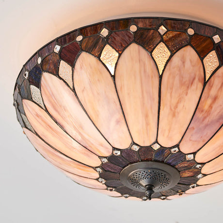 Marlgrove Tiffany 2-light flush ceiling light with domed leaded glass shade in cream, purple and amber panels on a metal frame.