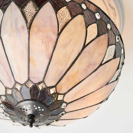 Close-up of the Tiffany Marlgrove Medium 3 Light semi-flush shade, showing hand-leaded multicoloured glass panels in pink and amber on a metal frame.
