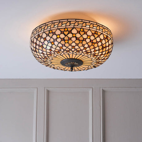 Tiffany Ravenstead Large 2 Light flush ceiling light with domed multicoloured leaded glass shade and dark metal fitting, mounted on a pale ceiling.