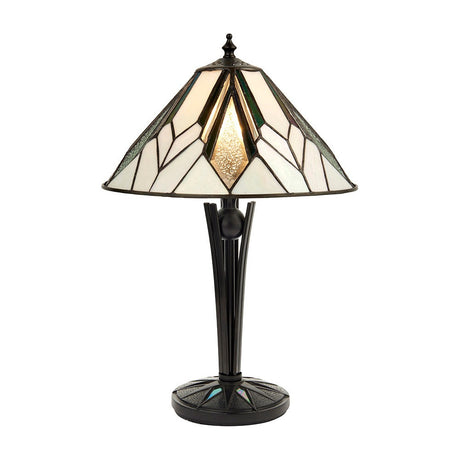 Larkbury Small Tiffany table lamp lit on a white background, with a multicoloured leaded glass shade on a black metal art deco base.