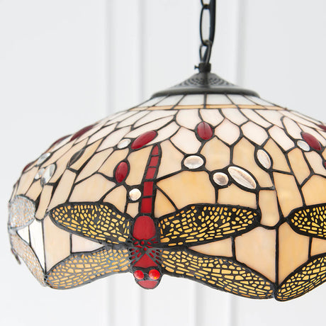 Alderworth Medium 3 Light Tiffany pendant in beige leaded glass with dragonfly motif, metal chain suspension, shown against a light panelled wall.