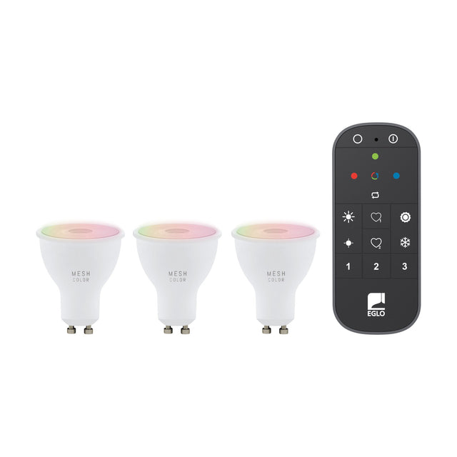 Three white GU10 smart LED bulbs with colour-changing tops shown alongside a black handheld remote with coloured buttons, on a plain white background.