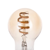 Smart LED GLS bulb, E27 fitting, amber-tinted glass with spiral filament around central stem, rounded shape, shown close-up on plain white background.