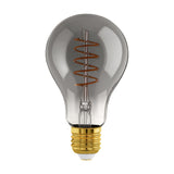 Smoked glass pear-shaped LED filament bulb with a spiral filament on a central stem and brass-coloured E27 screw cap, shown on a plain white background.