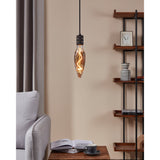 Smoked dimmable LED bulb with flame-shaped glass and visible spiral filament, E27 fitting, hung as a pendant light above a side table in a living room setting.