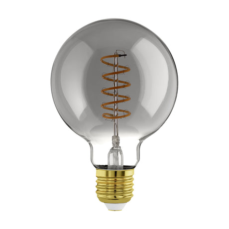Smoked glass G95 globe LED bulb with spiral amber filament and brass E27 screw cap, shown on a plain white background.