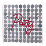 Party Neon Sign in pink script LED tubing mounted on a clear square panel backed with shimmering silver sequins, wall or mantel light-up decoration.