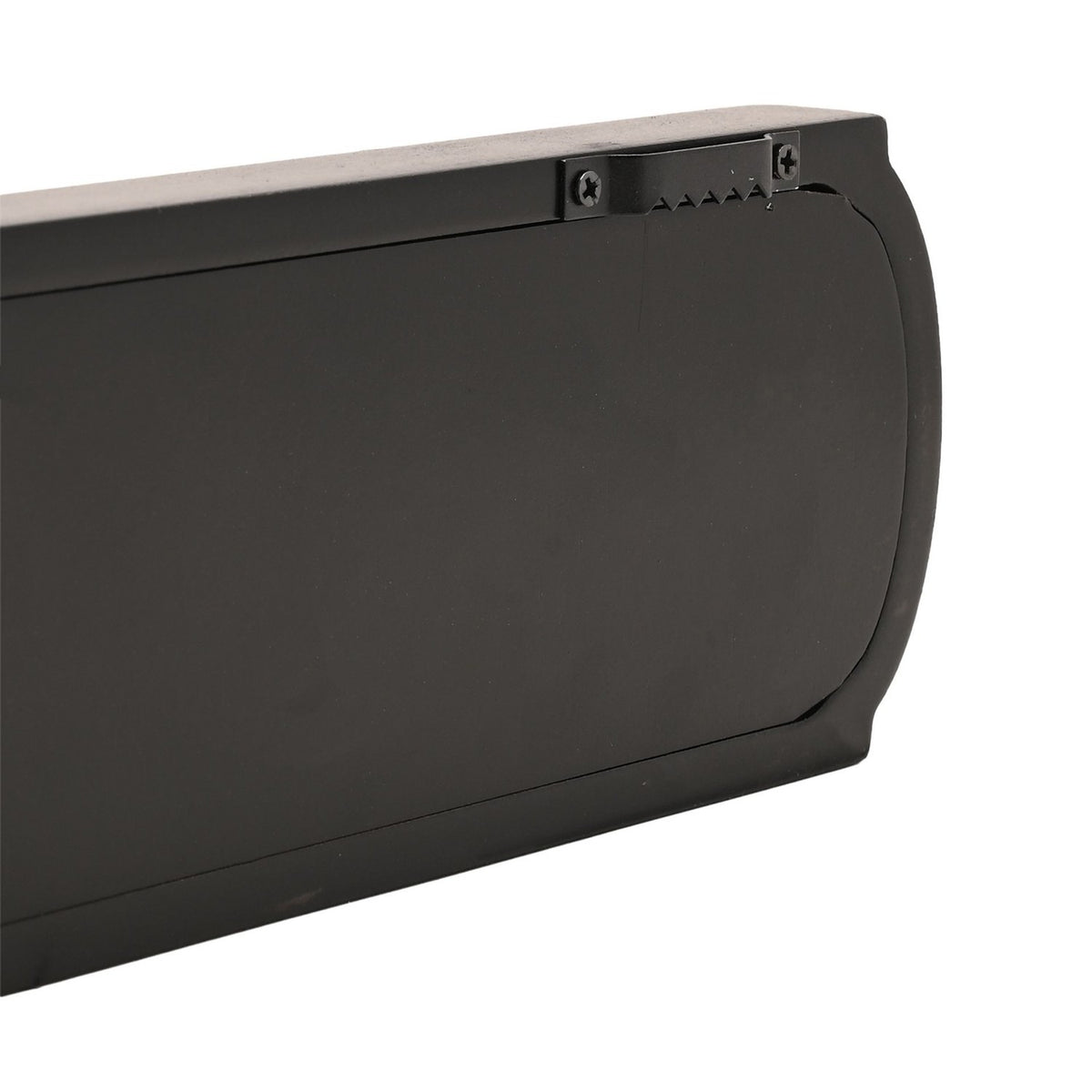Close-up of the Let That Shit Go wooden wall plaque in black, showing the shaped recessed panel edge, mounting hanger, and screw fixing on a plain white background.