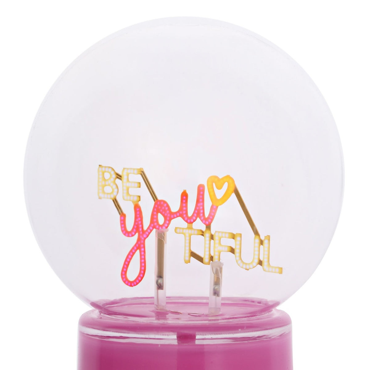 Be You Tiful Globe LED Neon Ceramic Table Lamp 22cm in pink, with "BE you TIFUL" lettering and a yellow heart floating inside a clear round globe on a pink base, shown on a white background.