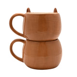 Capybara Head and Body Stacking Earthenware Mug in glazed brown, two round mugs stacked with ears and curved handles, shown on a plain white background.