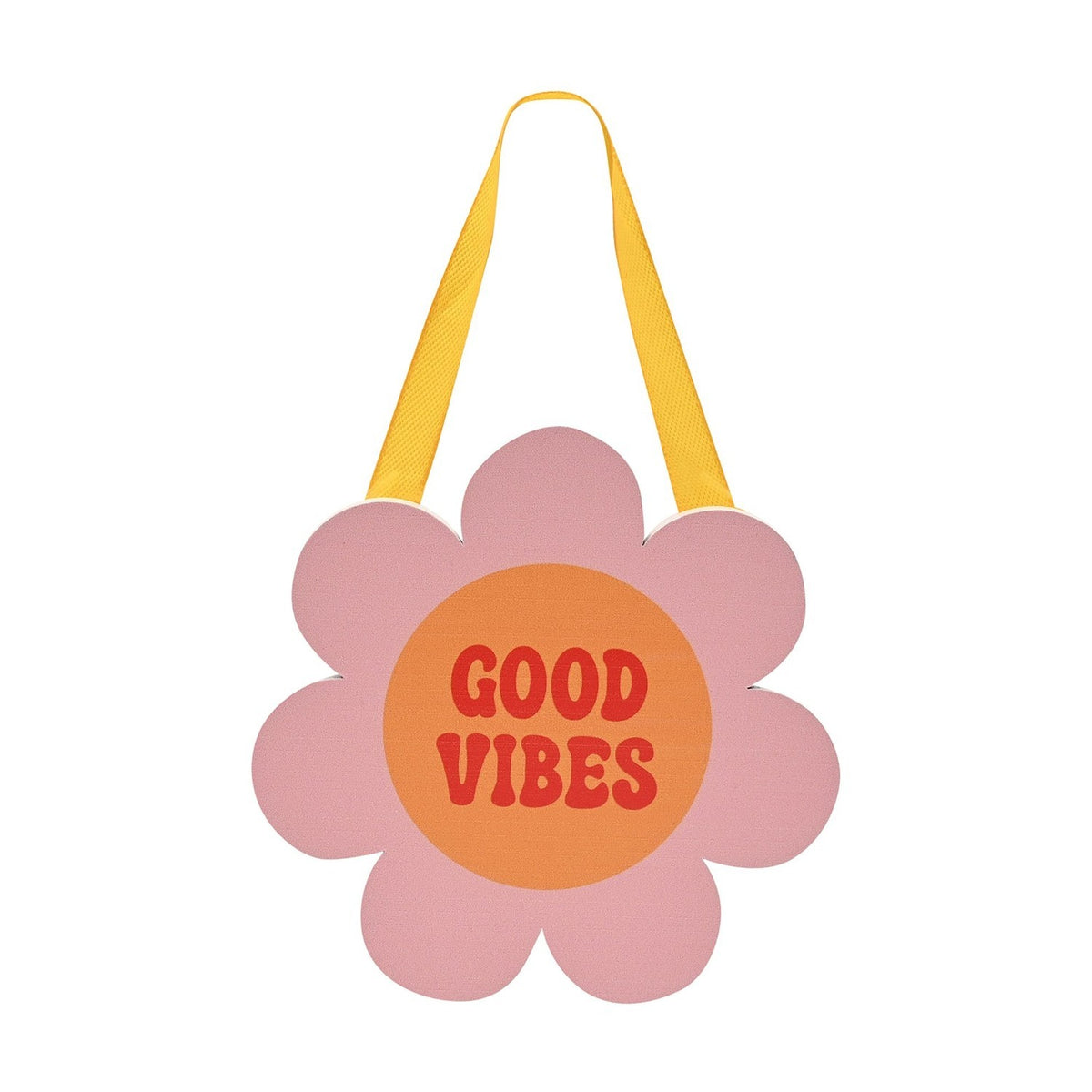 Wooden flower-shaped wall plaque in pink with an orange centre reading "Good Vibes" in red lettering, hung on a yellow ribbon against a plain white background.