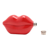 Red steel hip flask shaped like lips with a glossy finish and knurled silver screw cap, shown with cap removed beside it on a plain white background.
