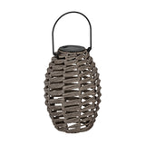 Solar LED table lamp with a woven grey egg-shaped body, round black top housing the solar panel, and an arched black wire handle, shown on a plain white background.