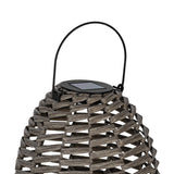 Close-up of the Solar LED Table Lamp 31cm in Grey, showing its woven oval body, black wire carry handle and integrated solar panel on top, against a plain white background.