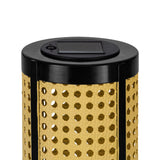 Close-up of the Solar LED Table Lamp's black top with integrated solar panel, above a cylindrical shade with cane-style pierced pattern in beige, set on a plain white background.