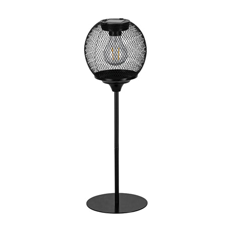 Solar LED table lamp in black steel with a round wire-mesh globe, built-in filament-style LED, solar panel on top, slim stem and round base, shown on a plain white background.