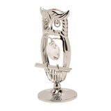 Chrome plated perched owl figurine with an open silver outline body, faceted crystal centrepiece, crystal eyes, and round pedestal base, shown on a plain white background.