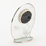 Rear view of the Classic Oval Glass & Wire Bumble Bee Mantel Clock, showing the black quartz movement and cream housing on frosted glass with silver-coloured wire frame, on a white background.