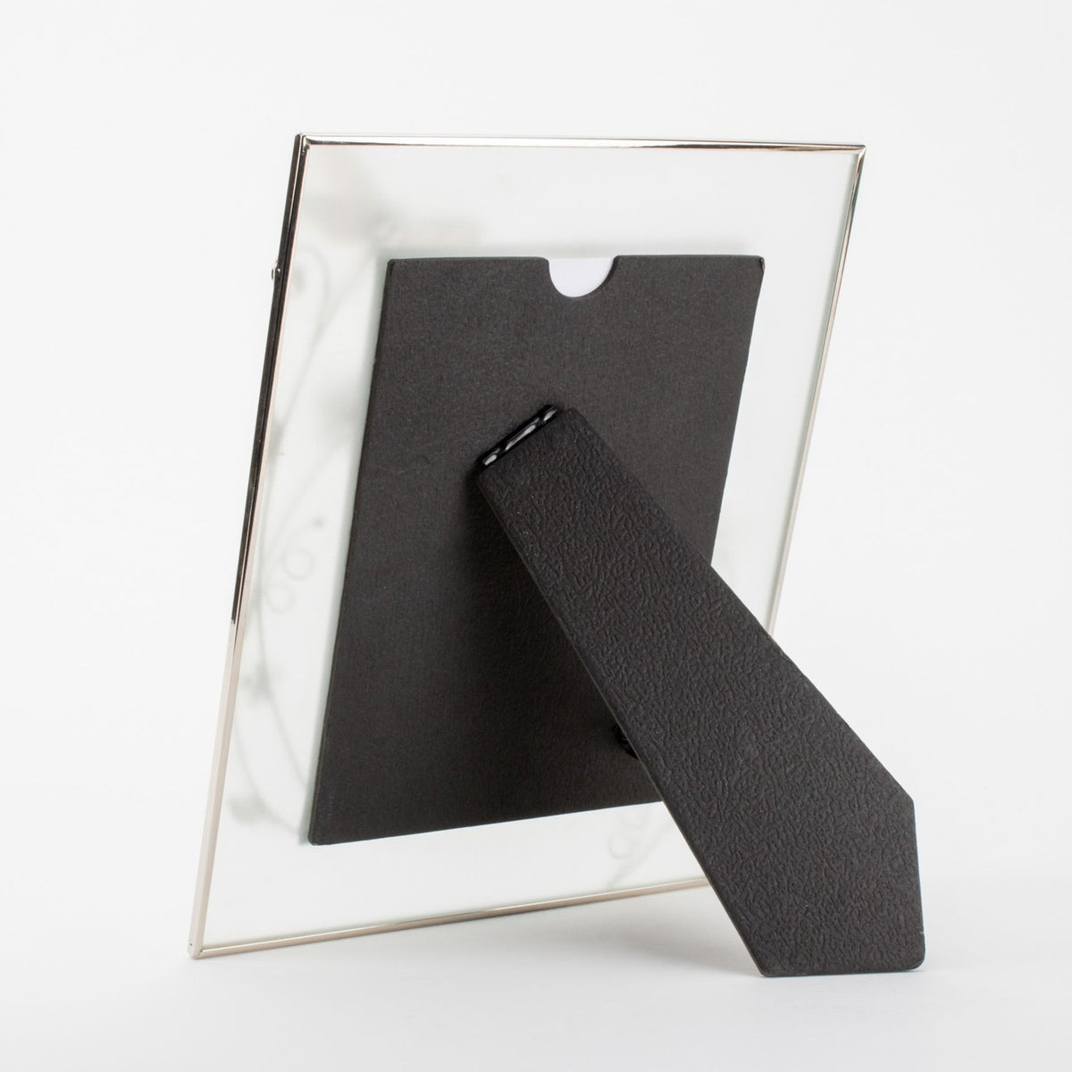 Rear view of the Classic Dragonfly Glass & Wire Photo Frame 6x4in in silver, showing the black easel stand and backing against a plain white background.