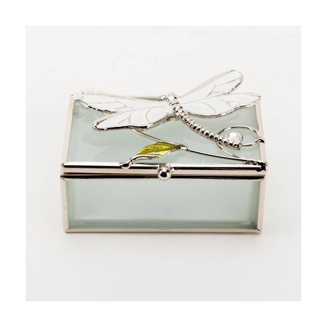 Rectangular frosted glass trinket box with silver-toned frame, white enamel dragonfly on the lid with wire stem, green leaf and pink-centred flower accent, shown on a plain white background.