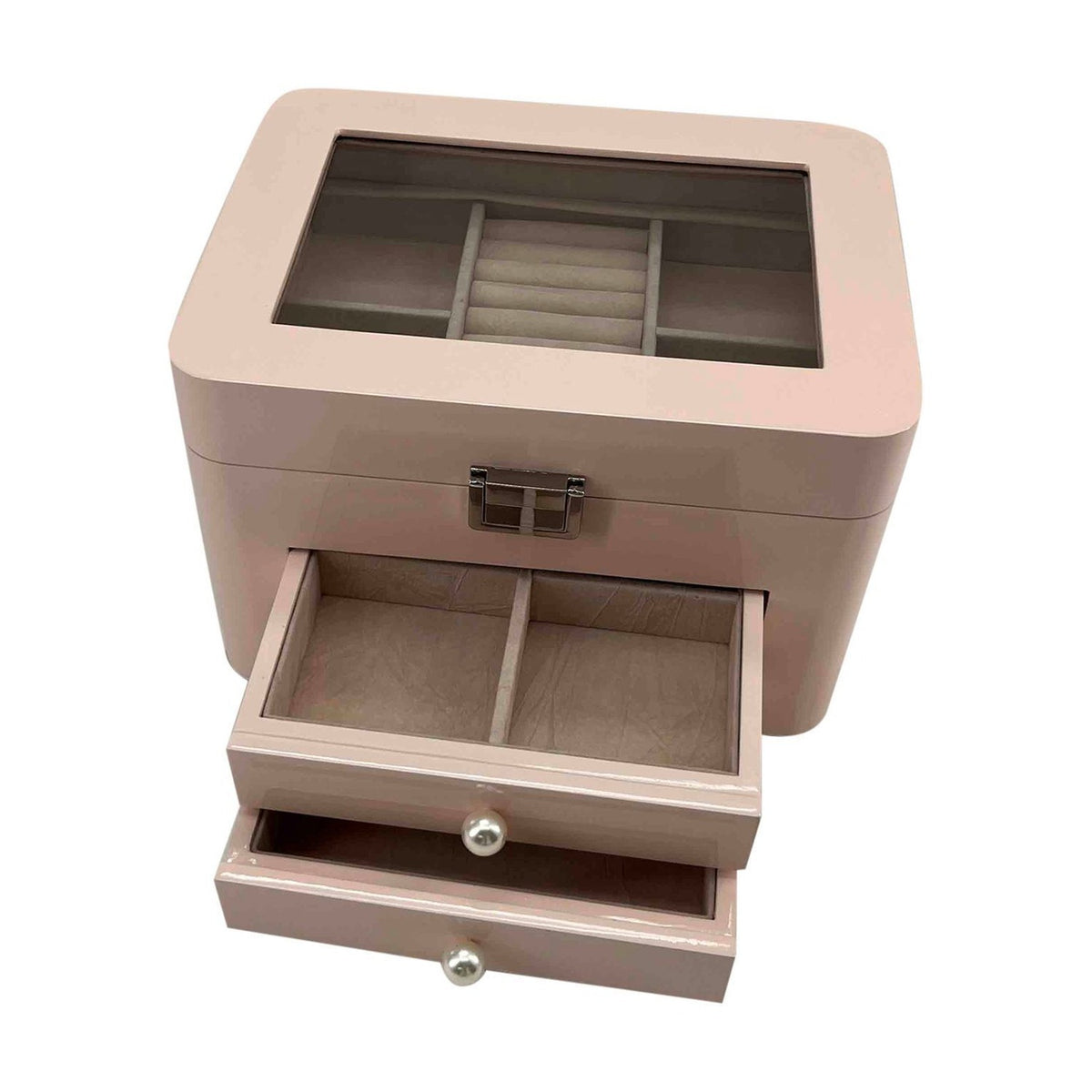 Pink gloss wooden jewellery box with a glass-top lid revealing lined compartments and a ring roll, plus two pull-out drawers with round knobs, on a white background.